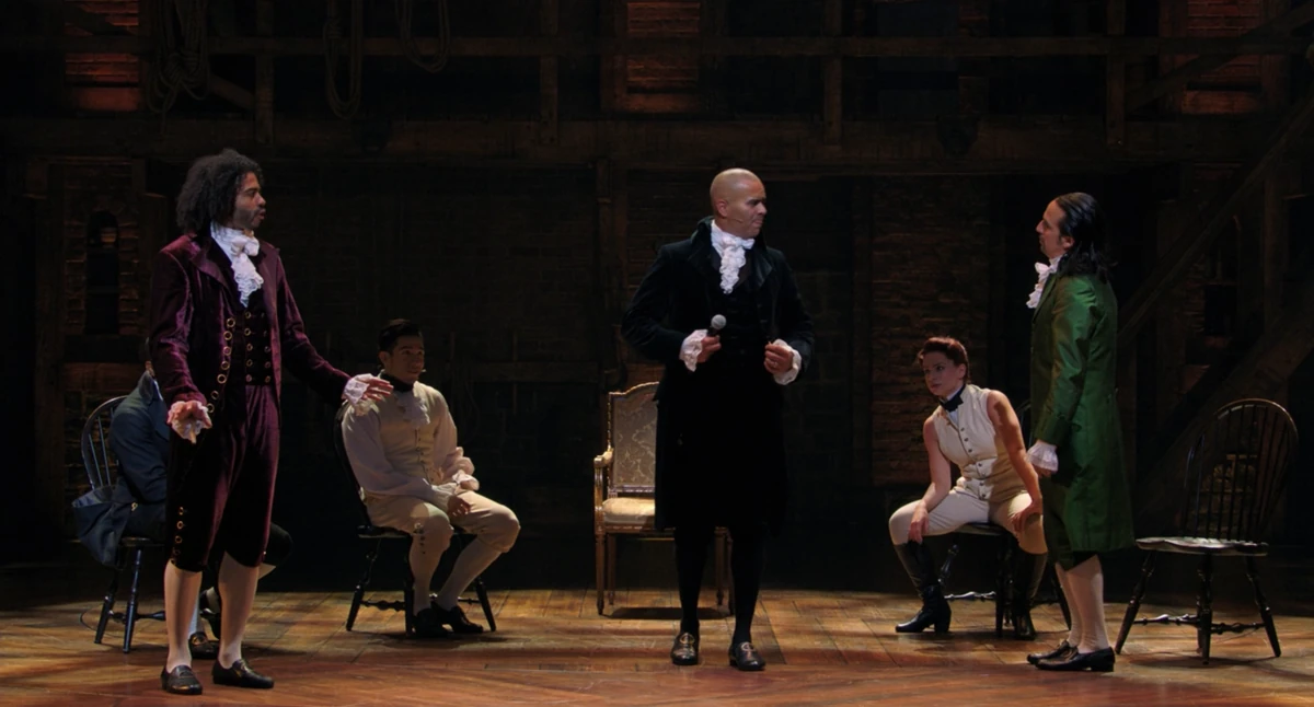 Still from Hamilton the Musical — the clip “Jefferson and Hamilton Debate Foreign Policy in Cabinet Battle #2”
